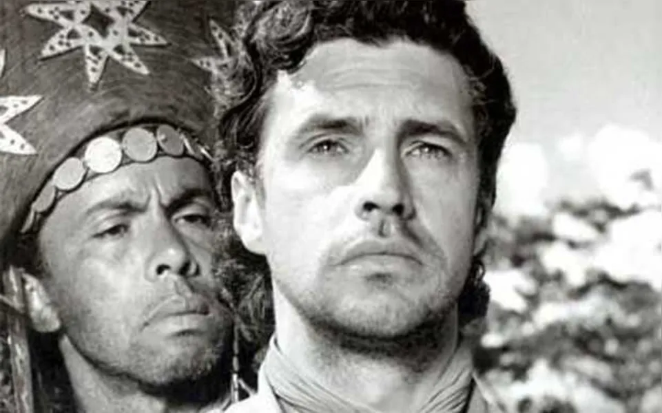 Eis Alberto Ruschel e Milton Ribeiro aparecem numa cena que por certo vai ser lembrada pelos que assistiram este que foi um dos filmes mais comentados em todo o mundo. Ao dizer isto relembro que ele foi distribuído pela Columbia Pictures no mundo inteiro como “um faroeste brasileiro”, o que já é uma curiosidade.