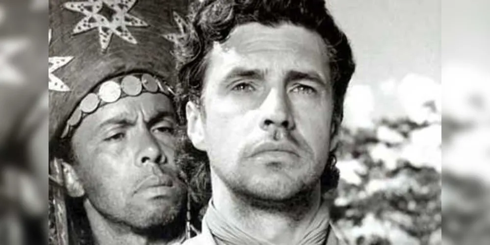 Eis Alberto Ruschel e Milton Ribeiro aparecem numa cena que por certo vai ser lembrada pelos que assistiram este que foi um dos filmes mais comentados em todo o mundo. Ao dizer isto relembro que ele foi distribuído pela Columbia Pictures no mundo inteiro como “um faroeste brasileiro”, o que já é uma curiosidade.