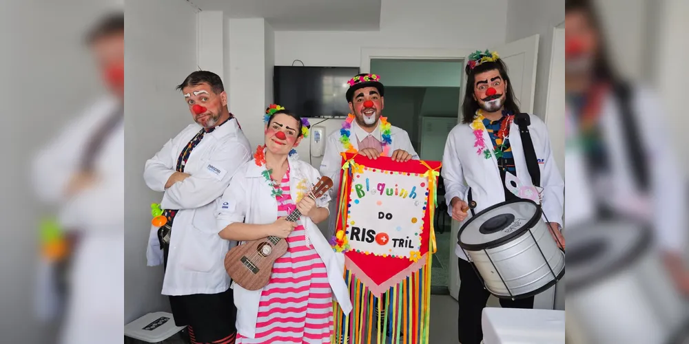 Ao som de marchinhas em paródias bem-humoradas, os artistas passam pelos corredores dos hospitais